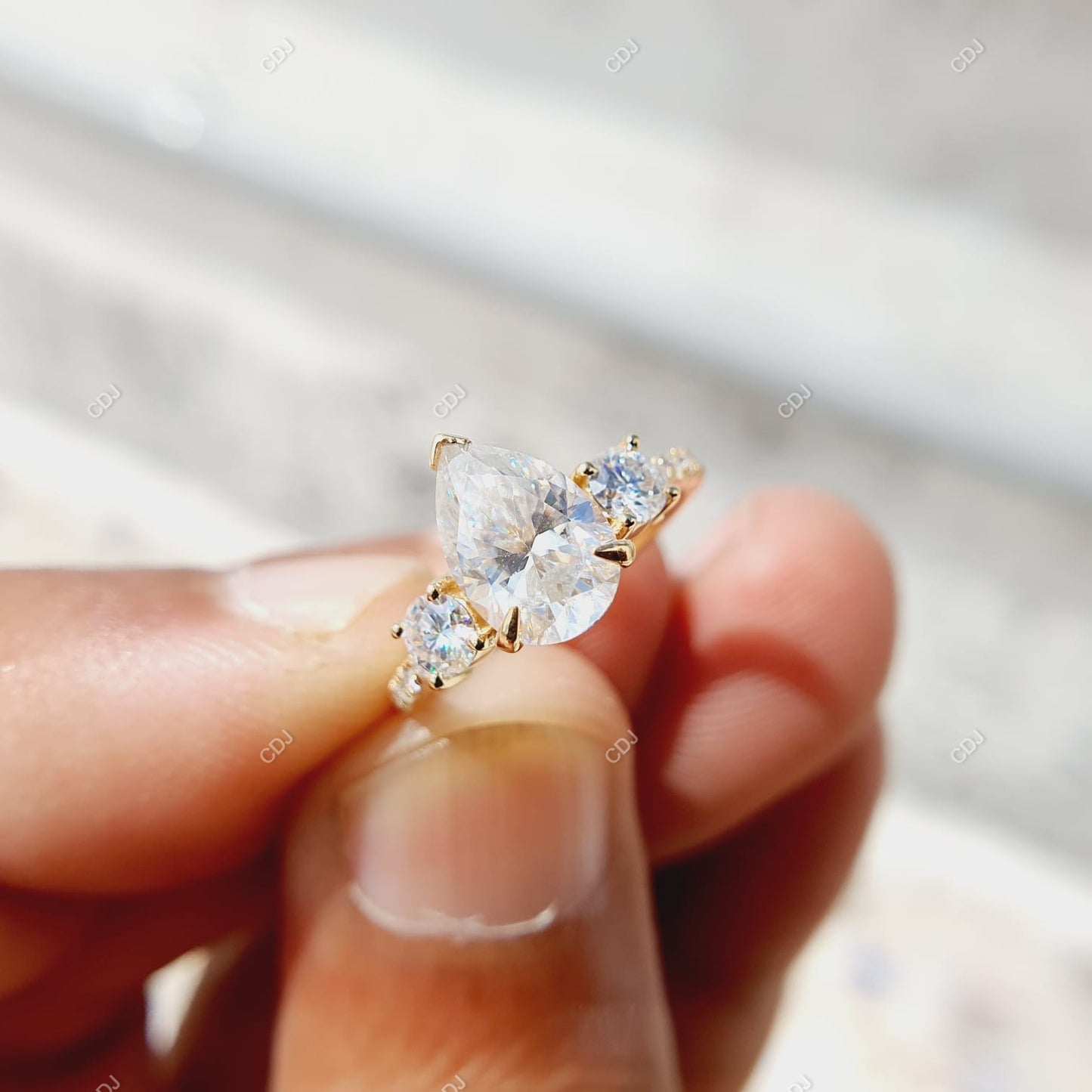 18K Gold 0.56 CTW Pear Cut Three-Stone Diamond Engagement Ring