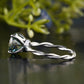 Teal Round Moissanite Twisted Band