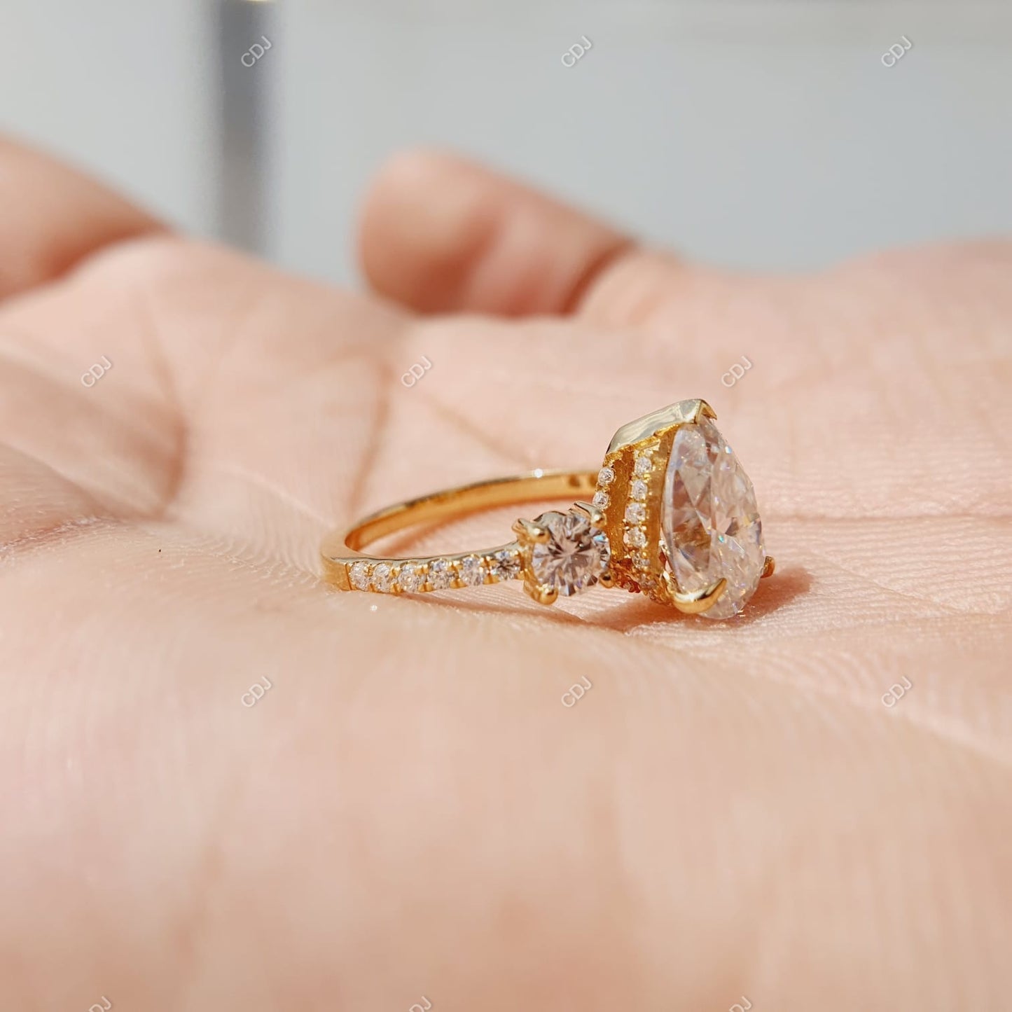 18K Gold 0.56 CTW Pear Cut Three-Stone Diamond Engagement Ring