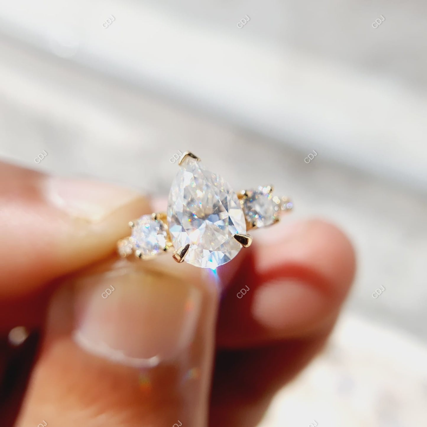 18K Gold 0.56 CTW Pear Cut Three-Stone Diamond Engagement Ring