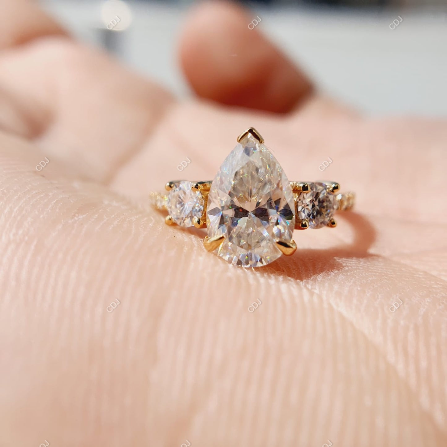18K Gold 0.56 CTW Pear Cut Three-Stone Diamond Engagement Ring