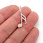 0.50CTW Musical Diamond Pendant