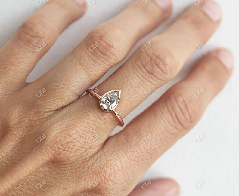 0.75CT Pear Cut Bezel Set Moissanite Engagement Ring