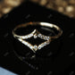 0.09CTW New Design Round Cut Moissanite Chevron Wedding Ring